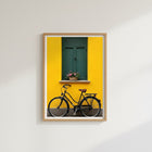Vintage Bicycle and Flowered Window Poster on Yellow Wall